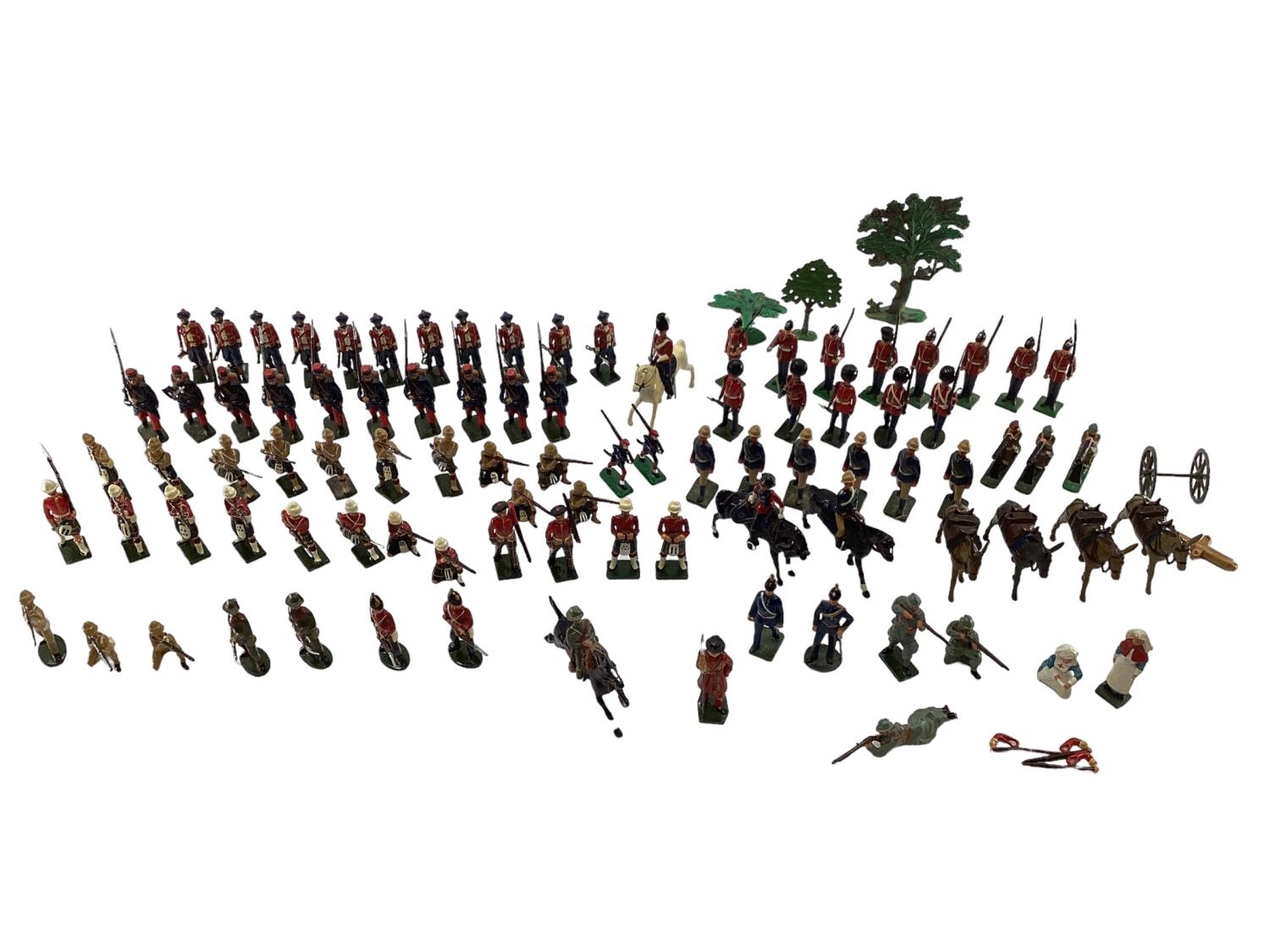 A Collection of hand painted cast lead soldiers from "Britain Moulds" nine sets in boxes, British,