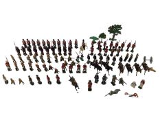 A Collection of hand painted cast lead soldiers from "Britain Moulds" nine sets in boxes, British,