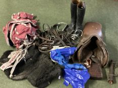 Quantity of various horse tack, and a leather saddle