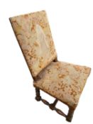 An oak framed high backed chair, upholstered in a tapestry fabric