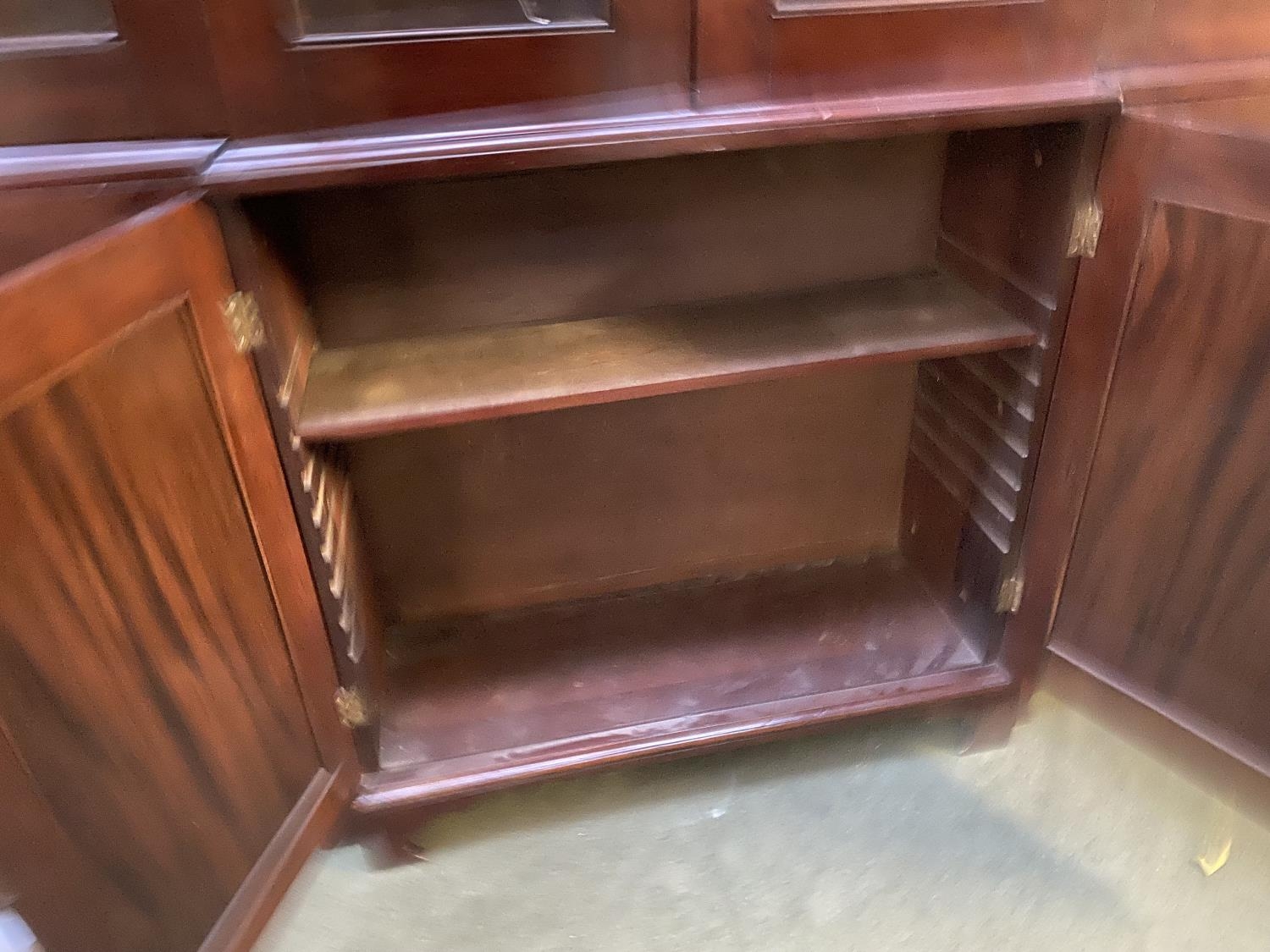 A large late C19th mahogany three sectioned glazed library bookcase, the top with swan neck - Image 5 of 5