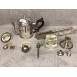 A collection of unmarked white metal and silver plated items to include nutcracker, teething ring, 2
