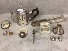 A collection of unmarked white metal and silver plated items to include nutcracker, teething ring, 2