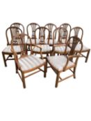 A set of 10 (8+2) dining chairs, with striped upholstered drop in seats