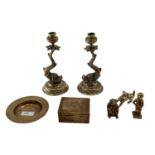 Collection of brass items to include a pair of stylised dolphin candlesticks etc