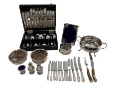 Collection of electroplated and white metal items to include a pierced picture frame, cutlery and