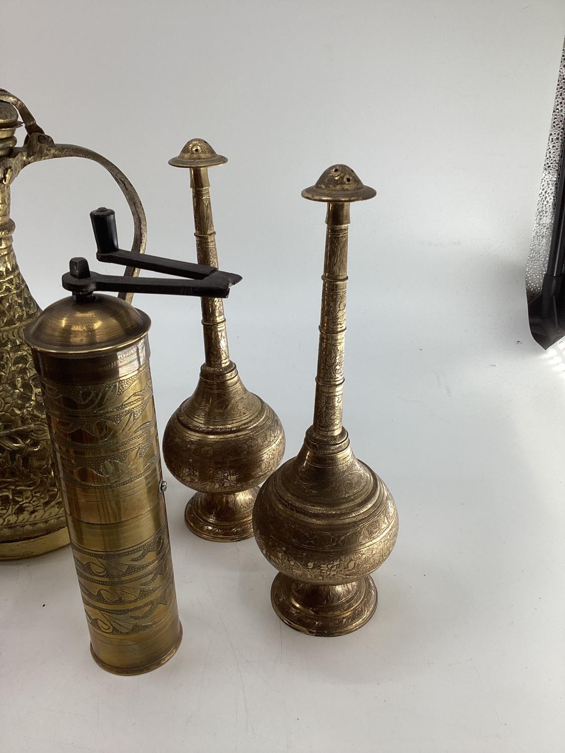 A collection of metalware to include Middle Eastern style ewers, trench art and other items - Image 8 of 15