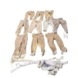 A quantity of vintage riding breeches, or hunting , jodhpurs all as found, and hunting stocks