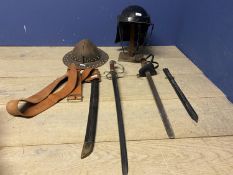 A reproduction/reinactment , Lobster pot helmet on stand, together with studded kettle helmet,