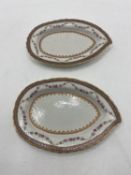 Pair of small hand painted Chinese export porcelain leaf form serving dishes with real gilt and