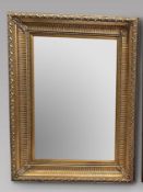 A Large Gilt Rectangular Mirror Height 125, Width 95 and Depth 10