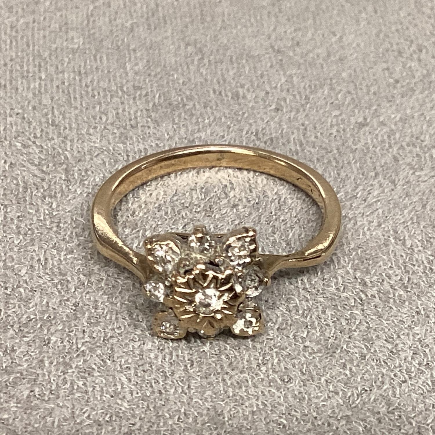 An unmarked (rubbed) yellow and white metal diamond set flower ring, size L - Image 6 of 6