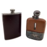 Two leatherbound white metal hip flasks, one by James Dixon and sons