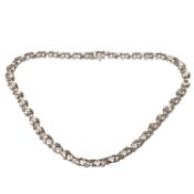 Tiffany & Co., An 18ct white gold and diamond necklace, circa 1999, possibly by Elsa Peretti, Knot