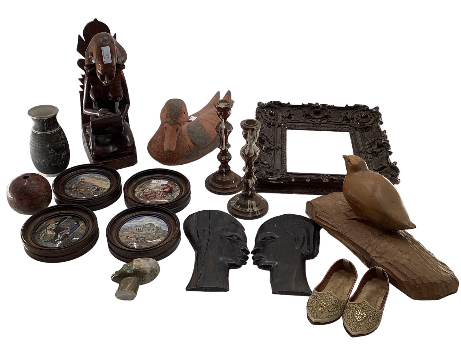 A misc collection of items to include framed Pot Lids, West African hardwood items and C20th