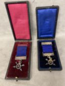 Two cased medals, labelled Harrow, D J B Frost, Bantam weight 1921, with some wear, and another