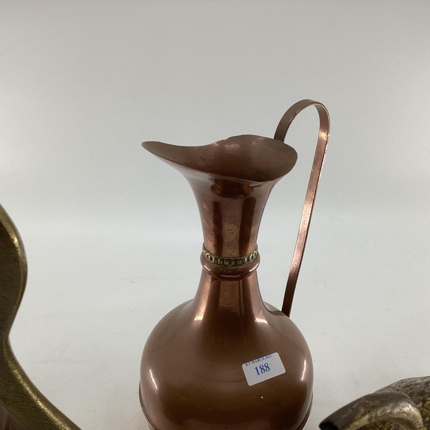 A collection of metalware to include Middle Eastern style ewers, trench art and other items - Image 14 of 15