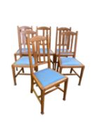 Set of 6 light coloured oak kitchen chairs, with blue seats