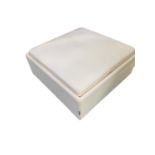 A modern white small stool/ottoman