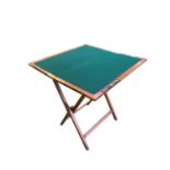 Folding games table, CRIBBAGE, opening to reveal green baize interior, and fitted games counters