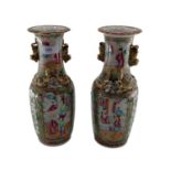 A pair of small late C19th/early C20th Chinese Famille Rose Baluster vases, gilt decoration with