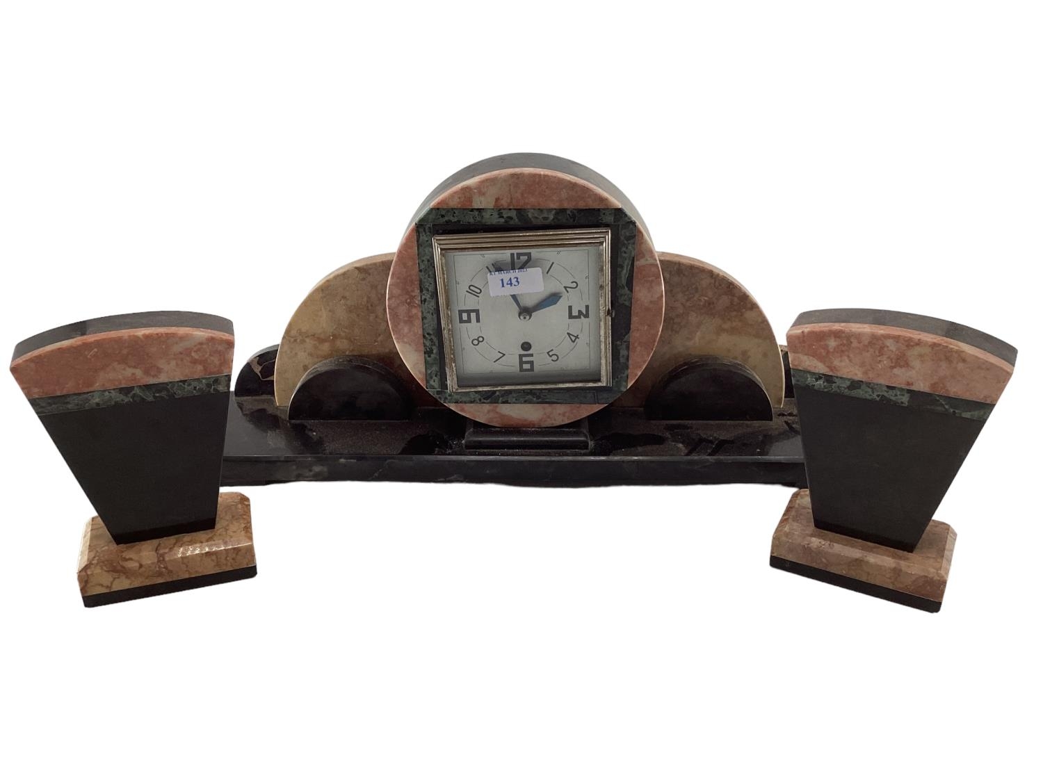 An Art Deco marble mantle clock and garniture Width 60, Height 40 and Depth 13 cm Clock Height 18
