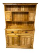 Antique pine Welsh dresser, a sideboard and circular pine kitchen table, all as found with some wear