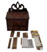 An oak hanging candle box, with single drawer, below containing a mixed selection of cigars,