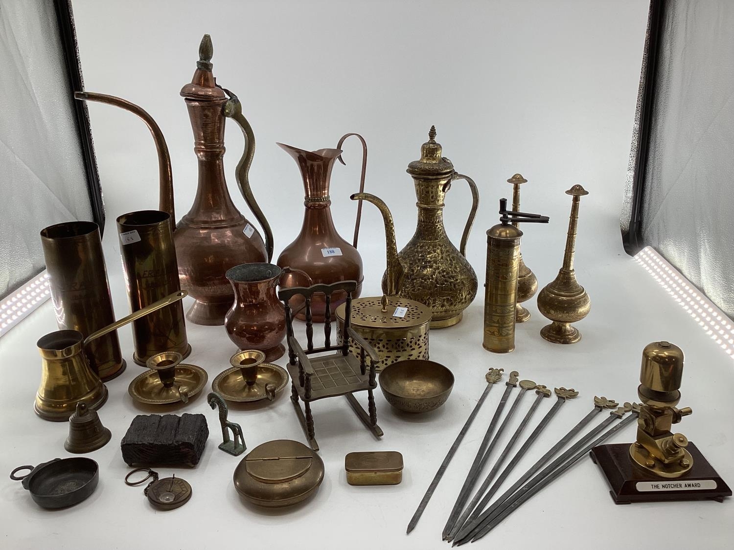 A collection of metalware to include Middle Eastern style ewers, trench art and other items - Image 2 of 15