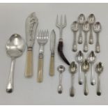 A collection of unmarked white metal and silver plated items to include fish sauce pickle fork etc