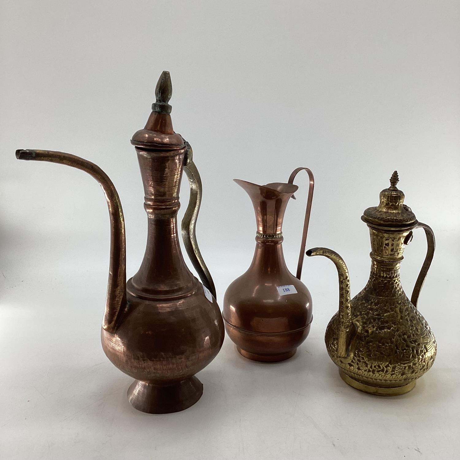 A collection of metalware to include Middle Eastern style ewers, trench art and other items - Image 9 of 15