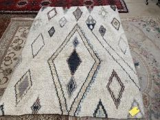 A Large, decorative modern rug (see photos) 242cm x 182 cm