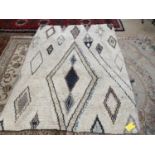 A Large, decorative modern rug (see photos) 242cm x 182 cm