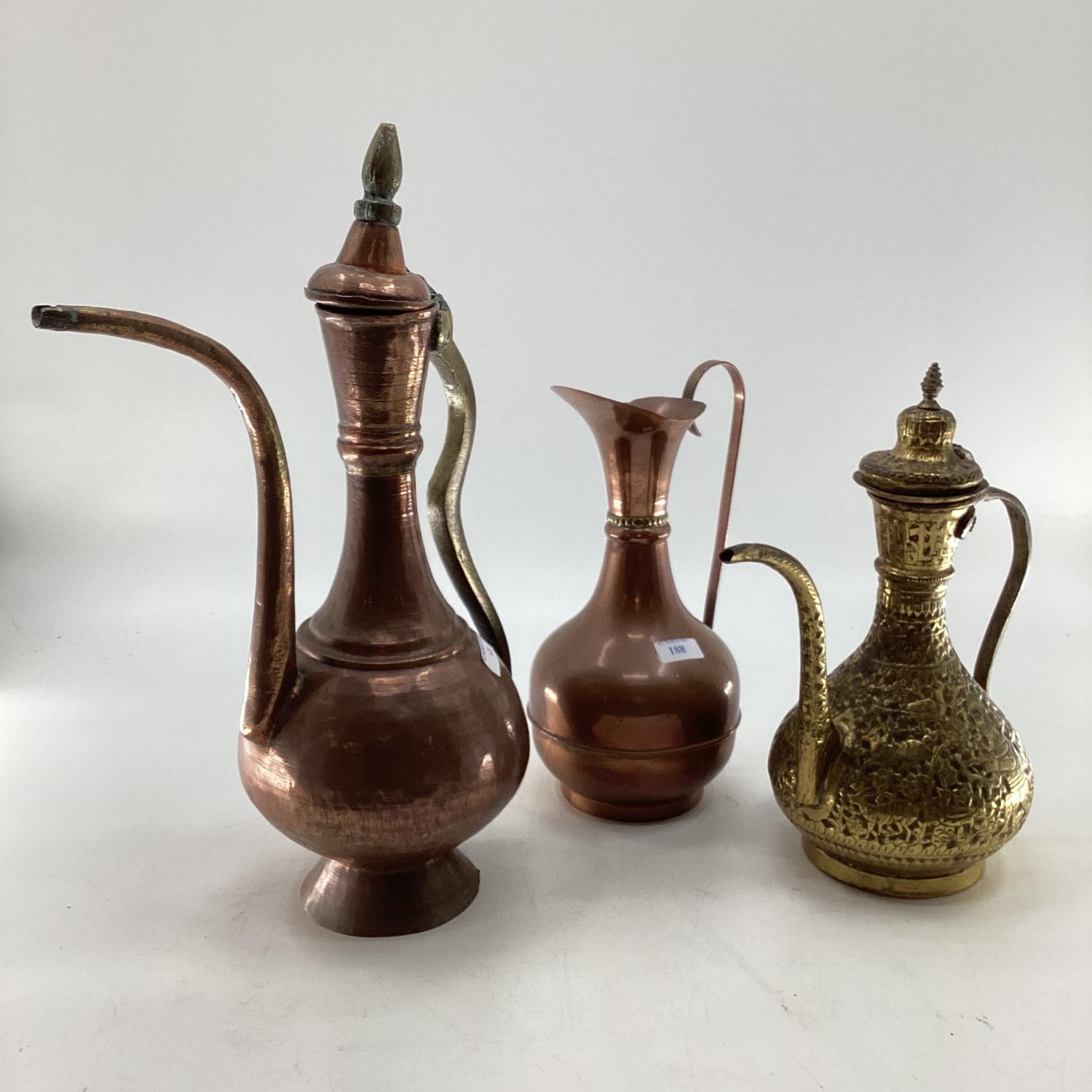 A collection of metalware to include Middle Eastern style ewers, trench art and other items - Image 12 of 15