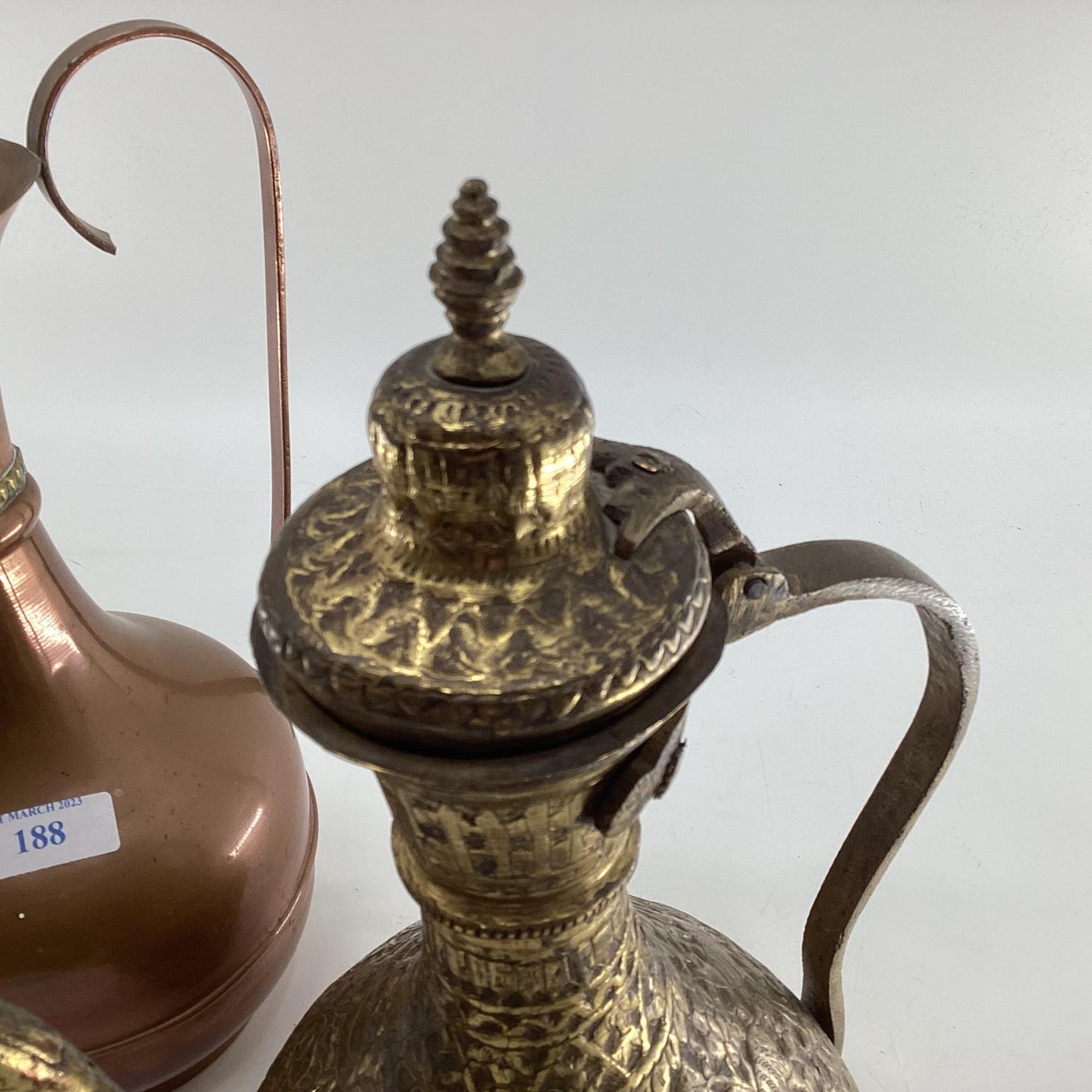 A collection of metalware to include Middle Eastern style ewers, trench art and other items - Image 15 of 15