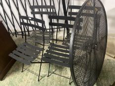 A Bistro Garden set, of a circular table and 4 chairs (top needs one screw )