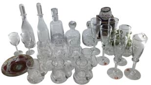 A collection of modern glassware to include Dartington decanters, embossed mugs, 6 champagne