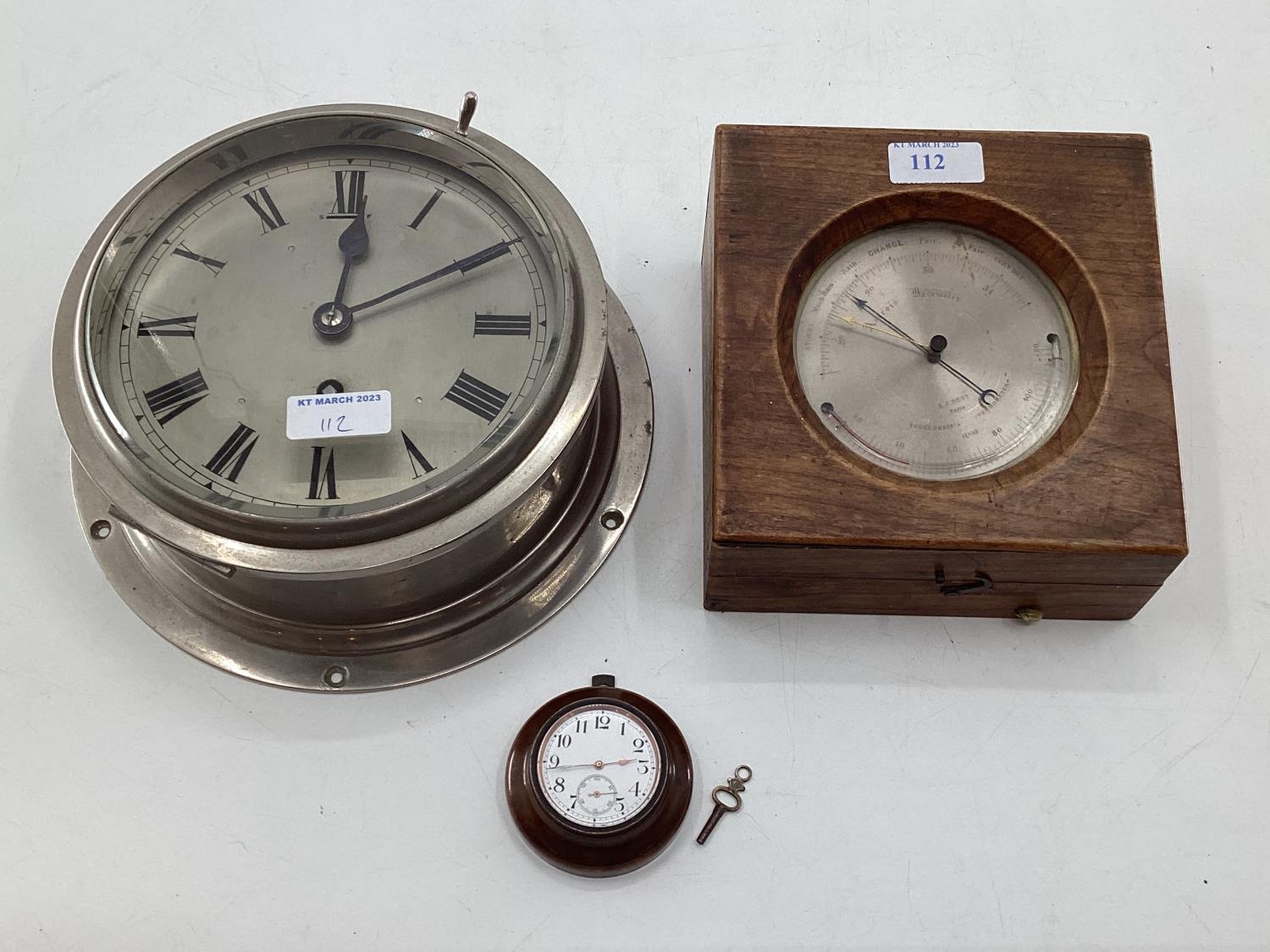 A boxed gilt brass ships barometer in oak case by E J Dent, Paris, and a ships clock and a small