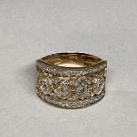 A 9ct gold half eternity ring set throughout with single cut diamonds, 3.7g size 0