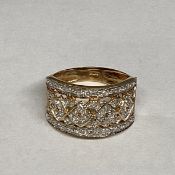 A 9ct gold half eternity ring set throughout with single cut diamonds, 3.7g size 0