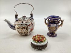 A Royal Crown Derby Style Imari pattern tea pot, with silver plated loop handle, cross sword mark to