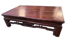 Three C19th Style Oriental oblong hardwood low tables, two with similar carved and pierced frieze,