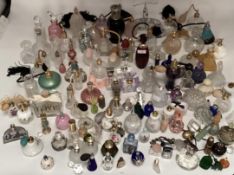 A large collection of perfume bottles mid to late C20th (quantity)