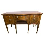 Mahogany and line inlaid serpentine front sideboard, central drawer fitted with compartments, and