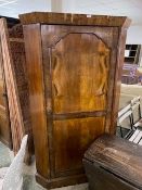 Mahogany veneered corner wardrobe, with single brass rail, 180cm H x 105cm some losses to veneer