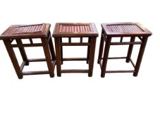 A pair of C19th/C20th Chinese hard wood side tables with inset split bamboo tops, square stretchers,