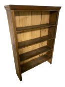 A Pine open fronted bookcase with 4shelves, on square supports, 158cmH x 103cmWide