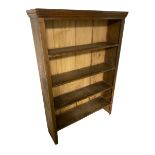 A Pine open fronted bookcase with 4shelves, on square supports, 158cmH x 103cmWide