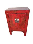 A C19th Style Chinese red lacquered wedding cabinet, of two doors decorated with Pagoda scenes;