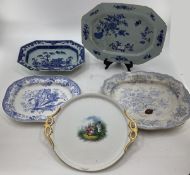 Four blue and white serving dishes together with a porcelain circular tray with gilt handles,